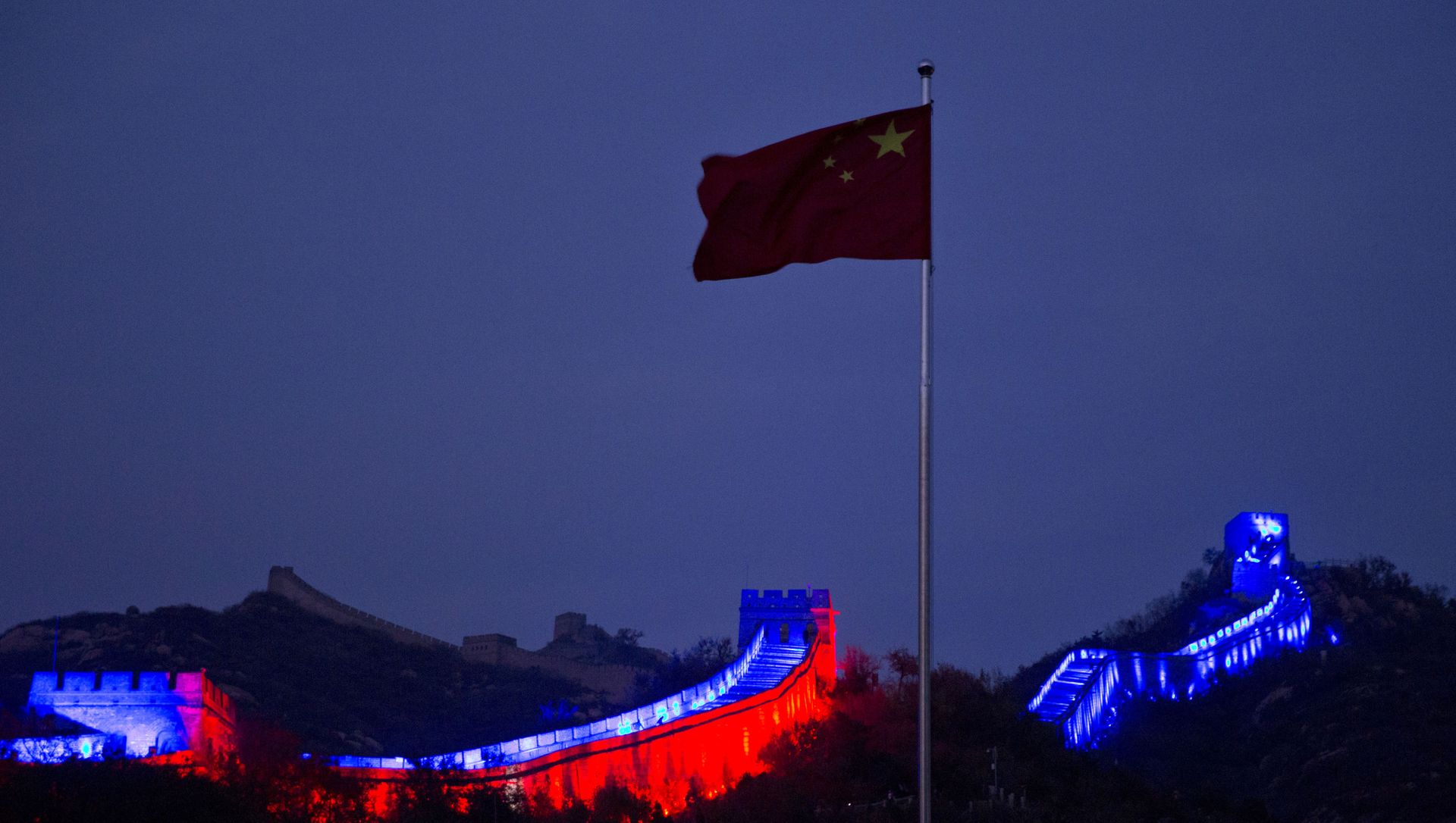 The Chinese national flag flies near a section of the Great Wall of China prepared to be lit by blue light to commemorate the 70th anniversary of the United Nations on the outskirts of Beijing, China, Saturday, Oct. 24, 2015. More than 200 iconic monuments, buildings, museums, bridges and other landmarks around the world were lighted up with blue - the official color of the United Nations to mark its 70th anniversary. The Chinese national flag flies near a section of the Great Wall of China prepared to be lit by blue light to commemorate the 70th anniversary of the United Nations on the outskirts of Beijing, China, Saturday, Oct. 24, 2015. More than 200 iconic monuments, buildings, museums, bridges and other landmarks around the world were lighted up with blue - the official color of the United Nations to mark its 70th anniversary. - Sputnik International, 1920, 09.04.2021
