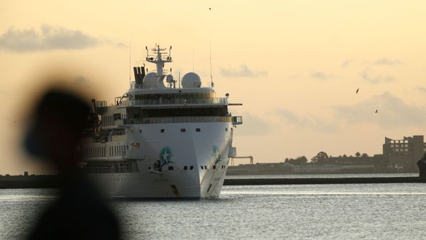 Australian cruise ship Greg Mortimer arrives at the port in Montevideo, Uruguay April 10, 2020 before its 112 Australian and New Zealander passengers be repatriated back to Australia during the coronavirus disease (COVID-19) outbreak - Sputnik International
