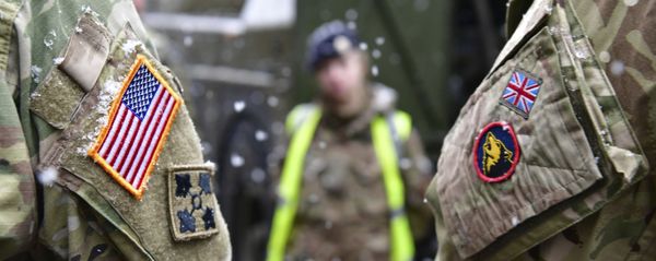 A British and an United States soldier stand side by side after a press conference on the military exercise 'Defender 2020' in Brueck, Germany, Wednesday, Feb. 26, 2020. The exercise with 37000 participants from a total of 18 nations will take place in Europe between January and about June 2020. A British and an United States soldier stand side by side after a press conference on the military exercise 'Defender 2020' in Brueck, Germany, Wednesday, Feb. 26, 2020. The exercise with 37000 participants from a total of 18 nations will take place in Europe between January and about June 2020. - Sputnik International