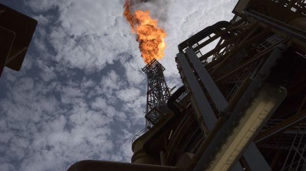 A view of the flare of the Kaombo Norte, an oil tanker converted into a FPSO vessel (Floating Production Storage and Offloading), owned by the French Total oil company, on November 8, 2018, about 250km off the coast of Angola in the Atlantic Ocean.  - Sputnik International