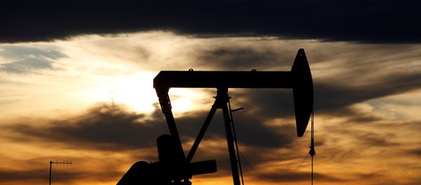FILE PHOTO: The sun sets behind a crude oil pump jack on a drill pad in the Permian Basin in Loving County, Texas, U.S. November 24, 2019. Picture taken November 24, 2019. FILE PHOTO: The sun sets behind a crude oil pump jack on a drill pad in the Permian Basin in Loving County, Texas, U.S. November 24, 2019. Picture taken November 24, 2019. - Sputnik International