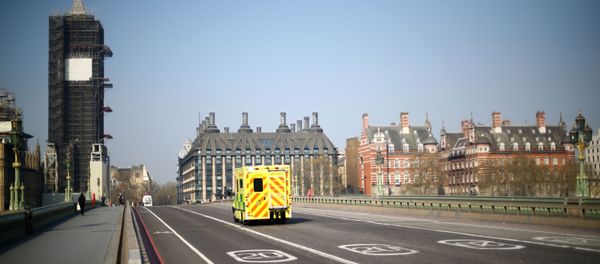 An ambulance is seen on Westminster bridge as the spread of the coronavirus disease (COVID-19) continues, in London, Britain April 9, 2020 An ambulance is seen on Westminster bridge as the spread of the coronavirus disease (COVID-19) continues, in London, Britain April 9, 2020 - Sputnik International