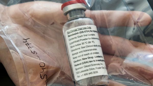 An ampule of Ebola drug Remdesivir is pictured during a news conference at the University Hospital Eppendorf (UKE) in Hamburg, Germany, April 8, 2020, as the spread of coronavirus disease (COVID-19) continues. - Sputnik International