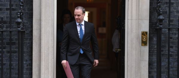 Britain's Foreign Secretary Dominic Raab leaves number 10 Downing street in central London after the daily Covid-19 briefing on April 15, 2020. - The new leader of Britain's opposition Labour Party urged the government today to set out how it plans to end the coronavirus lockdown, both to give people hope and avoid mistakes of the past. - Sputnik International
