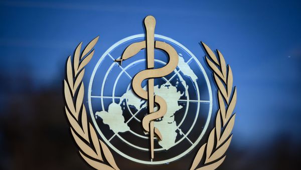In this file photo taken on 24 February 2020, A photo shows the logo of the World Health Organization (WHO) at their headquarters in Geneva. In this file photo taken on 24 February 2020, A photo shows the logo of the World Health Organization (WHO) at their headquarters in Geneva. - Sputnik International