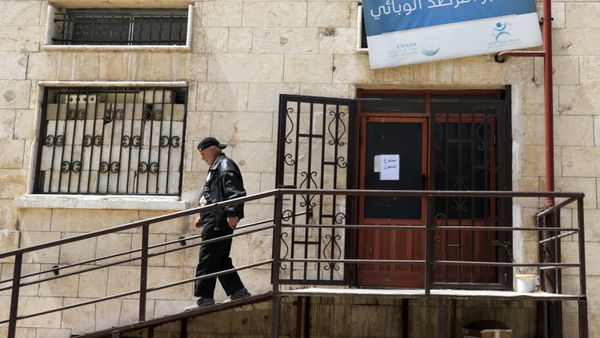 A man walks down the stairs inside a medical centre that deals with coronavirus disease (COVID-19) testing in Idlib, Syria 13 April 2020.  - Sputnik International