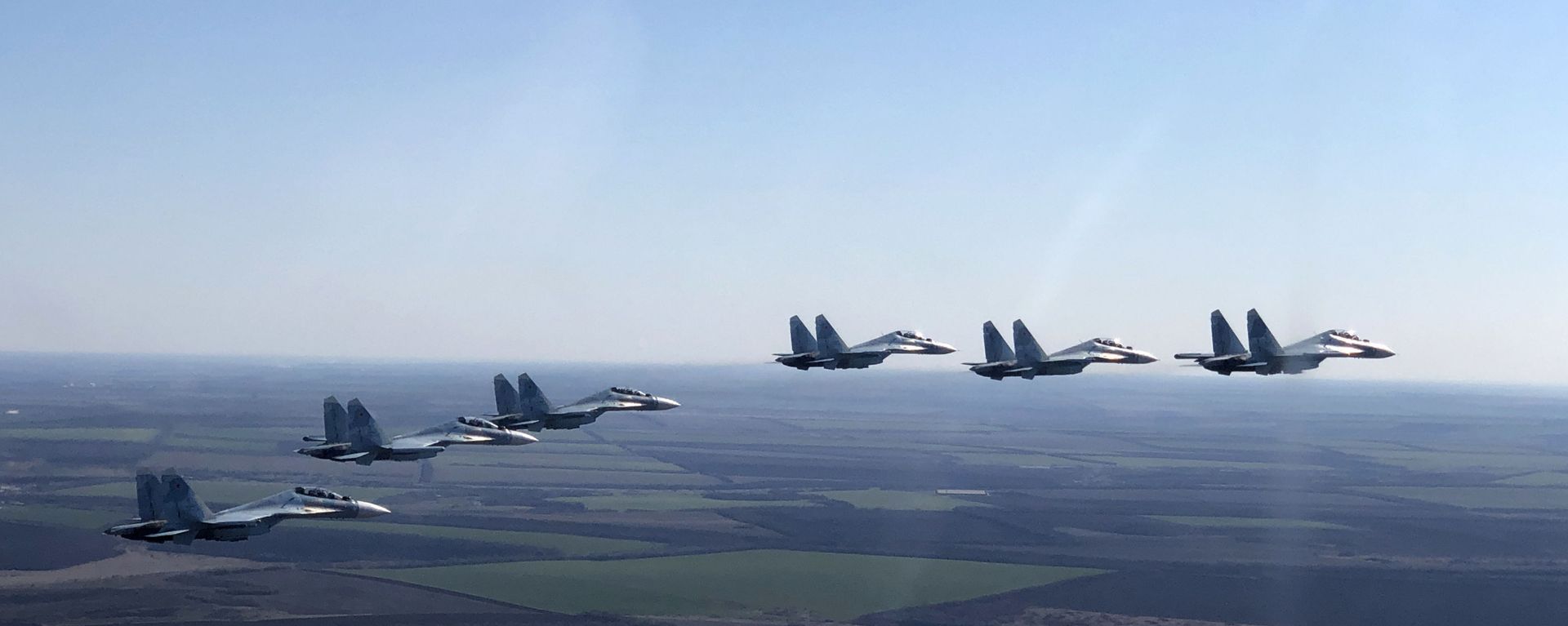 In this handout photo released by the Russian Defence Ministry, Su-30SM jet fighters of the 4th Air and Air Defence Forces Army of the Russian Southern Military District fly in formation during a rehearsal for the Victory Day parade in Rostov-on-Don, which marks the 75th anniversary of the victory over Nazi Germany in World War Two, in Rostov region, Russia In this handout photo released by the Russian Defence Ministry, Su-30SM jet fighters of the 4th Air and Air Defence Forces Army of the Russian Southern Military District fly in formation during a rehearsal for the Victory Day parade in Rostov-on-Don, which marks the 75th anniversary of the victory over Nazi Germany in World War Two, in Rostov region, Russia - Sputnik International, 1920, 03.12.2021