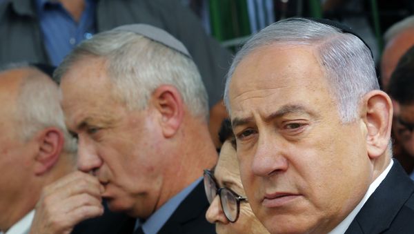 Israeli Prime Minister Benjamin Netanyahu (R), Israeli president of the Supreme Court  Esther Hayut (C) and Benny Gantz (L), leader of Blue and White party, attend a memorial ceremony for late Israeli president Shimon Peres, at Mount Herzl in Jerusalem on September 19, 2019 - Sputnik International