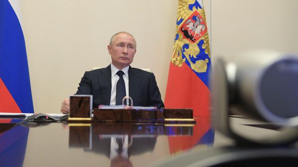 Russian President Vladimir Putin attends a meeting with members of the government via teleconference call at Novo-Ogaryovo state residence, outside Moscow, Russia Russian President Vladimir Putin attends a meeting with members of the government via teleconference call at Novo-Ogaryovo state residence, outside Moscow, Russia - Sputnik International