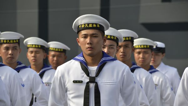 Taiwan sailors parade in front of a new frigate during a ceremony to commission two Perry-class guided missile frigates from the US into the Taiwan Navy, in the southern port of Kaohsiung on November 8, 2018. Taiwan sailors parade in front of a new frigate during a ceremony to commission two Perry-class guided missile frigates from the US into the Taiwan Navy, in the southern port of Kaohsiung on November 8, 2018. - Sputnik International
