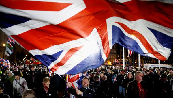 FILE PHOTO: A man waves a British flag on Brexit day in London, Britain January 31, 2020.  - Sputnik International