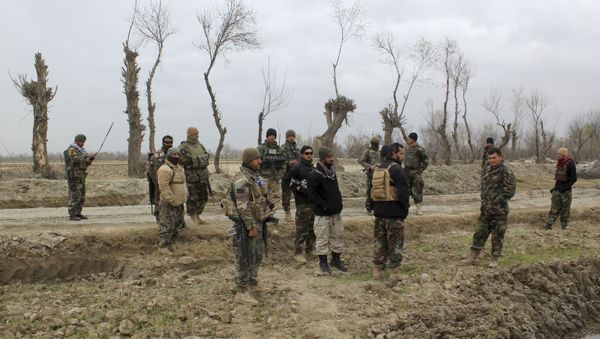 Afghan security forces stand guard after an attack by Taliban militants near an Afghan National Army (ANA) outpost, in Kunduz Province on March 4, 2020. Afghan security forces stand guard after an attack by Taliban militants near an Afghan National Army (ANA) outpost, in Kunduz Province on March 4, 2020. - Sputnik International