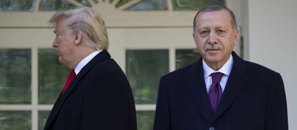 President Donald Trump walks off toward the Oval Office after posing for photographers with Turkish President Recep Tayyip Erdogan before a meeting in the Oval Office of the White House, Wednesday, Nov. 13, 2019, in Washington President Donald Trump walks off toward the Oval Office after posing for photographers with Turkish President Recep Tayyip Erdogan before a meeting in the Oval Office of the White House, Wednesday, Nov. 13, 2019, in Washington - Sputnik International