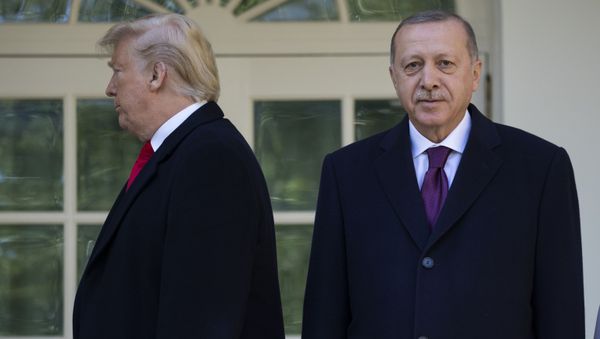President Donald Trump walks off toward the Oval Office after posing for photographers with Turkish President Recep Tayyip Erdogan before a meeting in the Oval Office of the White House, Wednesday, Nov. 13, 2019, in Washington President Donald Trump walks off toward the Oval Office after posing for photographers with Turkish President Recep Tayyip Erdogan before a meeting in the Oval Office of the White House, Wednesday, Nov. 13, 2019, in Washington - Sputnik International