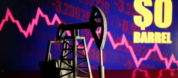 A 3D-printed oil pump jack is seen in front of a displayed stock graph and $0 Barrel words in this illustration picture, April 20, 2020 A 3D-printed oil pump jack is seen in front of a displayed stock graph and $0 Barrel words in this illustration picture, April 20, 2020 - Sputnik International