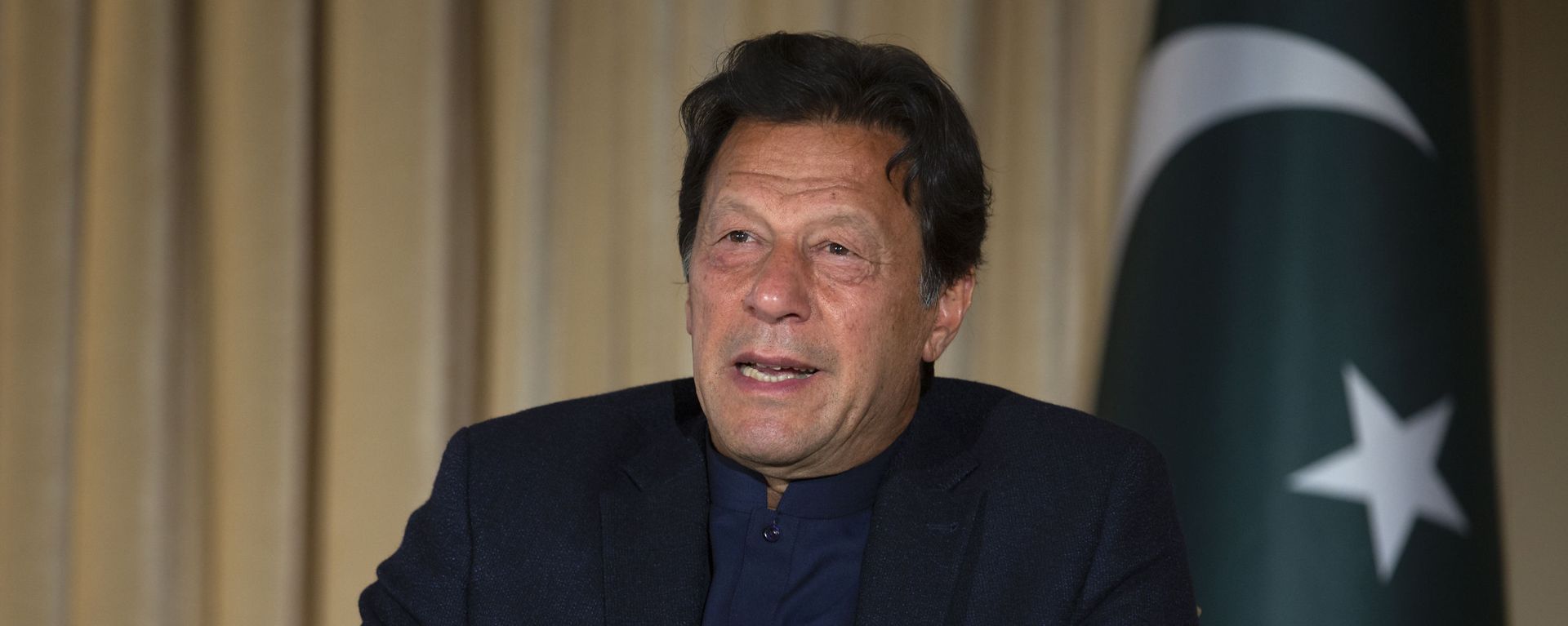 Pakistan's Prime Minister Imran Khan speaks to The Associated Press, in Islamabad, Pakistan, Monday, March 16, 2020 Pakistan's Prime Minister Imran Khan speaks to The Associated Press, in Islamabad, Pakistan, Monday, March 16, 2020 - Sputnik International, 1920, 24.02.2021
