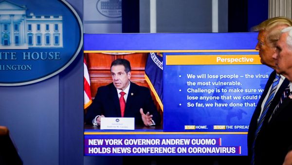 U.S. President Donald Trump and U.S. Vice President Mike Pence watch a video of New York governor Andrew Cuomo speaking at Cuomo's daily briefing, during the daily coronavirus disease (COVID-19) task force briefing at the White House in Washington, U.S., April 19, 2020. - Sputnik International
