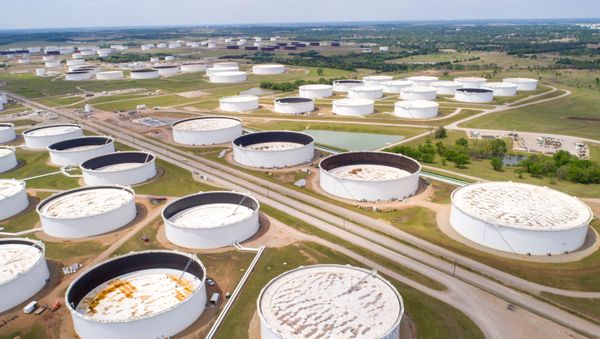 Crude oil storage tanks are seen in an aerial photograph at the Cushing oil hub in Cushing, Oklahoma, U.S. April 21, 2020 - Sputnik International