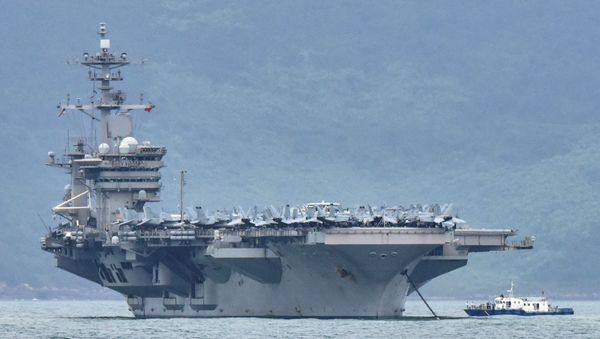 The USS Theodore Roosevelt (CVN-71) is pictured as it enters the port in Da Nang, Vietnam, March 5, 2020 - Sputnik International