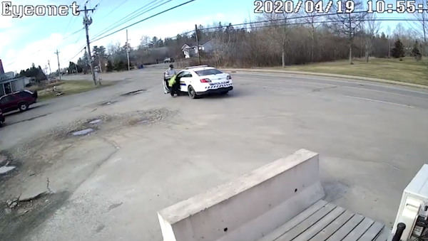 Screenshot of the surveillance video of alleged Nova Scotia shooter in a parking lot, April 2020 Screenshot of the surveillance video of alleged Nova Scotia shooter in a parking lot, April 2020 - Sputnik International