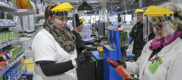 Workers wearing protective clothing are seen, as the spread of the coronavirus disease (COVID-19) continues, in Vantaa, Finland April 1, 2020 - Sputnik International