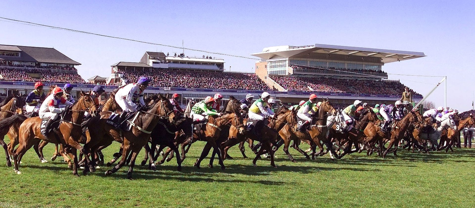 Tape goes up signalling the start of the 155th Grand National at Aintree in Liverpool. Jockey Jim Culloty, riding 20-1 shot Bindaree, beat Richard Johnson, who was riding What's Up Boys, by a length and three quarters.      Culloty, who won the Cheltenham Gold Cup a few weeks earlier, got to ride Bindaree after an injury to fellow jockey Jamie Goldstein.      Bindaree looked to be in trouble after being overtaken by What's Up Boys over the last fence but Culloty manoeuvred him back into the lead to pick up the win and collect 290,000 pounds  ($355,540) in prize money.  - Sputnik International, 1920, 24.04.2020