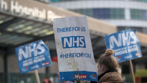 NHS signs are seen outside Queen Elizabeth Hospital during the Clap for our Carers campaign in support of the NHS, as the spread of the coronavirus disease (COVID-19) continues, in Birmingham, Britain, April 23, 2020. NHS signs are seen outside Queen Elizabeth Hospital during the Clap for our Carers campaign in support of the NHS, as the spread of the coronavirus disease (COVID-19) continues, in Birmingham, Britain, April 23, 2020. - Sputnik International