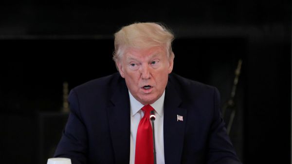 U.S. President Trump hosts a coronavirus response roundtable discussion with industry executives at the White House in Washington - Sputnik International