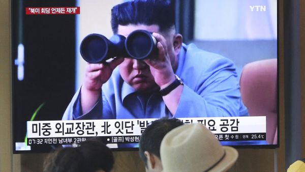 People watch a TV showing a file footage of North Korean leader Kim Jong Un during a news program at the Seoul Railway Station in Seoul, South Korea, Friday, Aug. 2, 2019 - Sputnik International