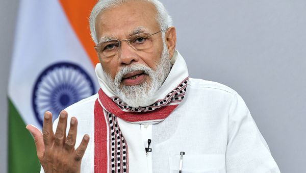 In this handout photo taken and released by the Indian Press Information Bureau (PIB) on 14 April 2020, India's Prime Minister Narendra Modi addresses the nation during a government-imposed nationwide lockdown which was instigated as a preventive measure against the COVID-19 pandemic, in New Delhi - Sputnik International