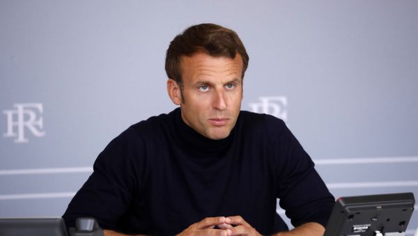 French President Emmanuel Macron attends a video conference call with local authorities from La Reunion, Mayotte and Saint Pierre et Miquelon territories about the coronavirus pandemic at the Elysee Palace in Paris, France, April 30, 2020 - Sputnik International