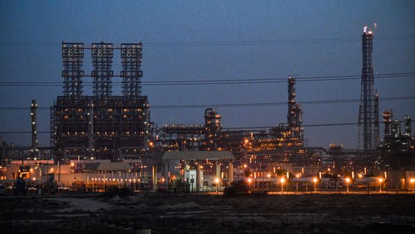 This picture taken on December 11, 2019, shows a view of a refinery at the Jubail Industrial City, about 95 kilometres north of Dammam in Saudi Arabia's eastern province overlooking the Gulf - Sputnik International