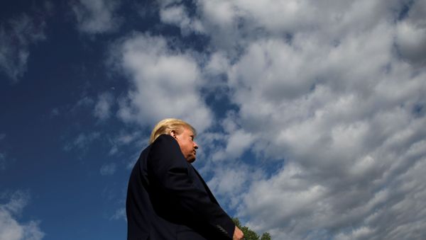 U.S. President Donald Trump heads to the Marine One helicopter to depart for a weekend at Camp David from the South Lawn of the White House in Washington, U.S., May 1, 2020 - Sputnik International