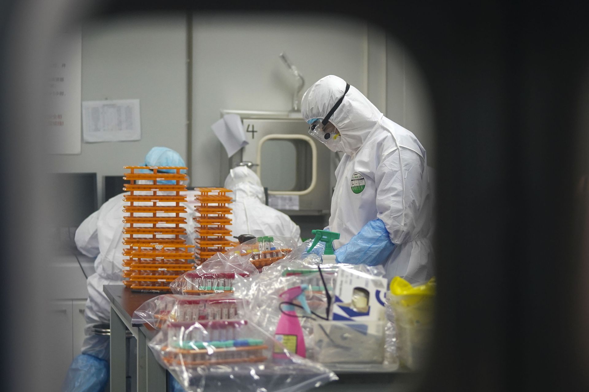 This Saturday, Feb. 22, 2020, photo released by Xinhua News Agency, shows medical workers in protective suits at a coronavirus detection lab in Wuhan in central China's Hubei Province. The fresh national figures for the disease that emerged in China in December came as the number of viral infections soared mostly in and around the southeastern city of Daegu, where they were linked to a local church and a hospital. This Saturday, Feb. 22, 2020, photo released by Xinhua News Agency, shows medical workers in protective suits at a coronavirus detection lab in Wuhan in central China's Hubei Province. The fresh national figures for the disease that emerged in China in December came as the number of viral infections soared mostly in and around the southeastern city of Daegu, where they were linked to a local church and a hospital. - Sputnik International, 1920, 07.09.2021