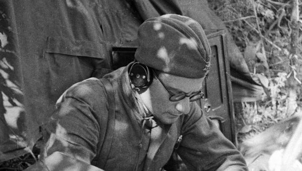 A Soviet radio operator jots down information from the Sovinformbureau, May 1942. A Soviet radio operator jots down information from the Sovinformbureau, May 1942. - Sputnik International