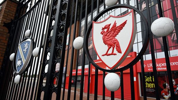In this file photo taken on April 18, 2020 a locked gate and emblem are seen at Liverpool football club's stadium Anfield in Liverpool, northwest England. - Sputnik International
