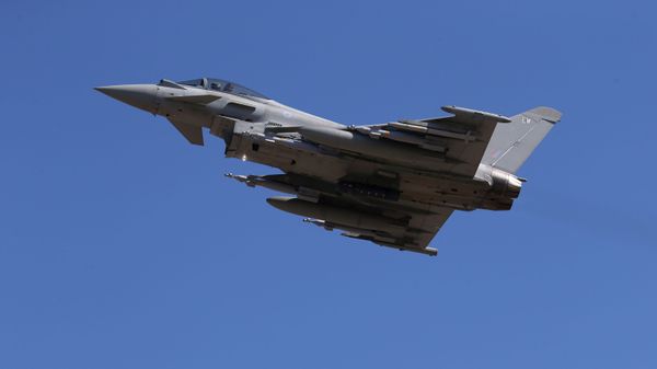 In this Thursday, Sept. 22, 2016, a Typhoon aircraft takes off from RAF, Akrotiri, Cyprus.  British air forces for a mission in Iraq.  - Sputnik International