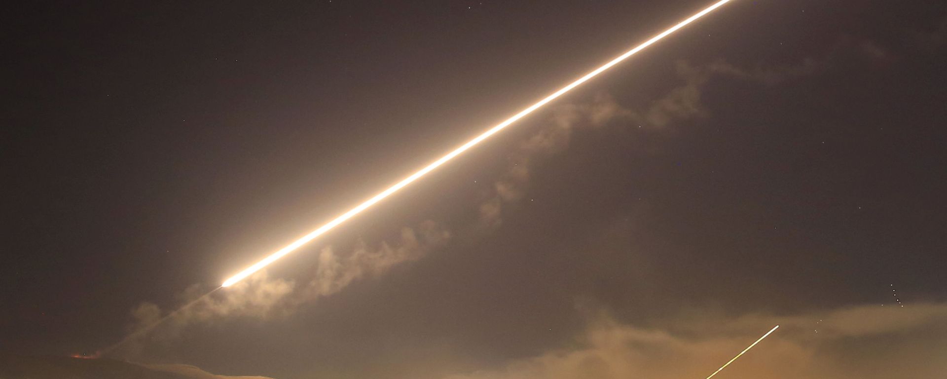 FILE - In this April 14, 2018 file photo, Damascus skies erupt with surface to air missile fire as the U.S. launches an attack on Syria targeting different parts of the Syrian capital Damascus, Syria FILE - In this April 14, 2018 file photo, Damascus skies erupt with surface to air missile fire as the U.S. launches an attack on Syria targeting different parts of the Syrian capital Damascus, Syria - Sputnik International, 1920, 06.12.2024
