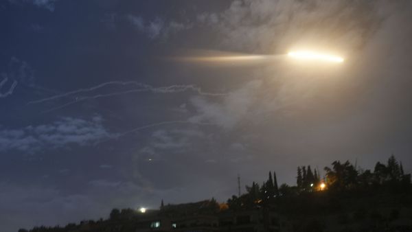 In this photo released by the Syrian official news agency SANA, shows missiles flying into the sky near international airport, in Damascus, Syria, Monday, Jan. 21, 2019 - Sputnik International