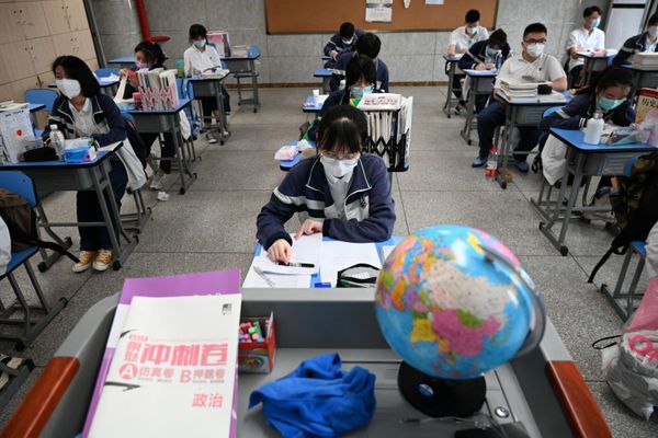 Photos: Students Living in China's COVID-19 Epicenter Return to School - Sputnik International