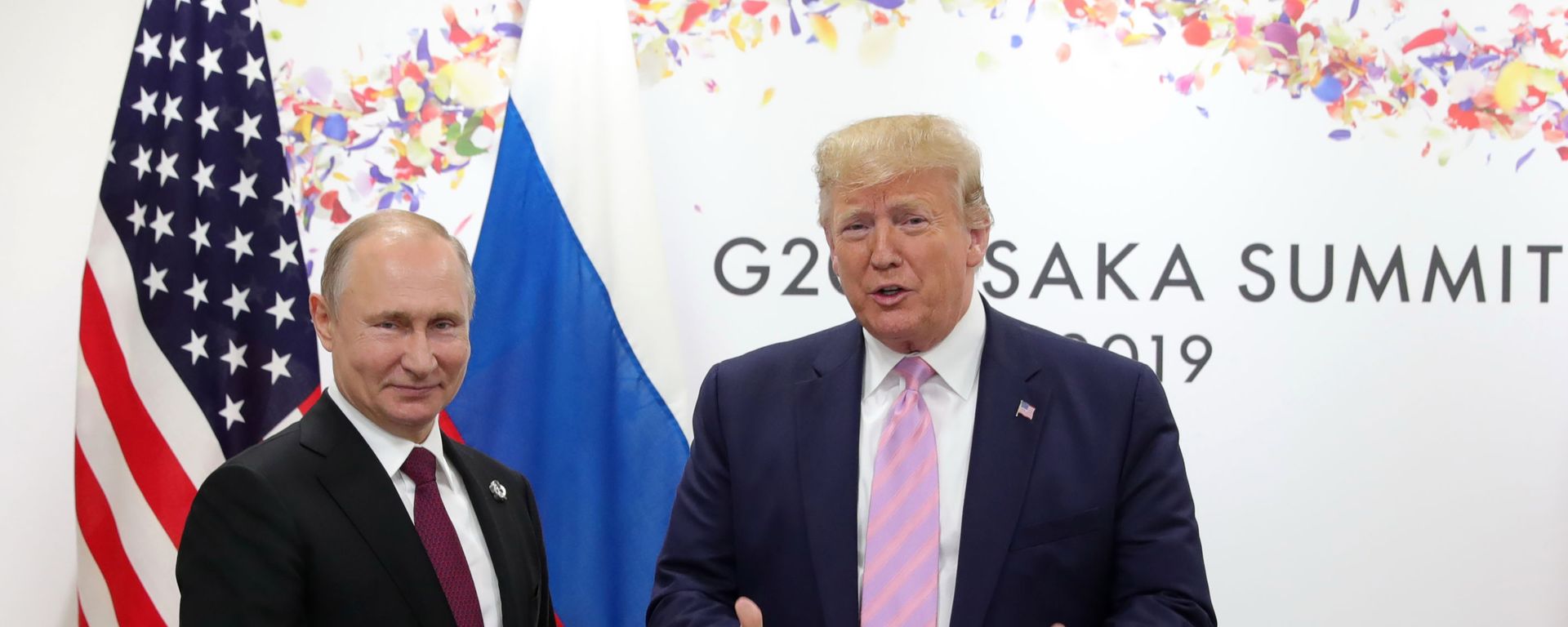 U.S. President Donald Trump, right, and Russian President Vladimir Putin pose for a photo during a bilateral meeting on the sidelines of the G-20 summit in Osaka, Japan, Friday, June 28, 2019. U.S. President Donald Trump, right, and Russian President Vladimir Putin pose for a photo during a bilateral meeting on the sidelines of the G-20 summit in Osaka, Japan, Friday, June 28, 2019. - Sputnik International, 1920, 11.02.2024