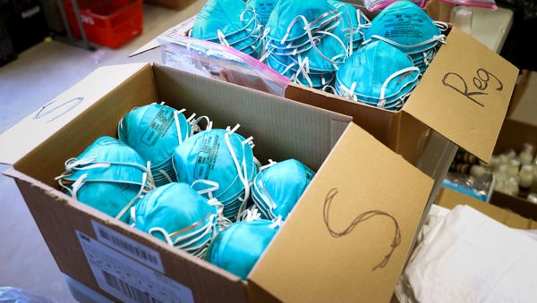 Boxes of N95 protective masks for use by medical field personnel are seen at a New York State emergency operations incident command center during the coronavirus outbreak in New Rochelle, New York, U.S., March 17, 2020.  - Sputnik International