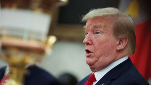 U.S. President Donald Trump speaks to reporters during a meeting with Texas Governor Greg Abbott about coronavirus disease (COVID-19) response in the Oval Office at the White House in Washington, U.S., May 7, 2020. - Sputnik International