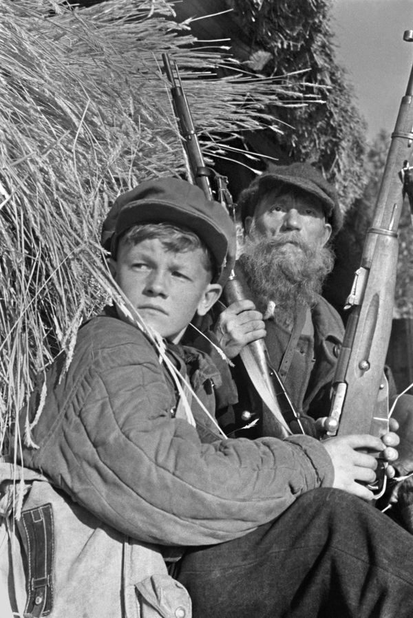Partisans on patrol. 13-year-old Lenya Fedorov and a farmer from the Borets collective farm, Grishin, who joined the partisan detachment despite his advanced age. The Soshikhinsky district of the Leningrad region, June 1943. Partisans on patrol. 13-year-old Lenya Fedorov and a farmer from the Borets collective farm, Grishin, who joined the partisan detachment despite his advanced age. The Soshikhinsky district of the Leningrad region, June 1943. - Sputnik International