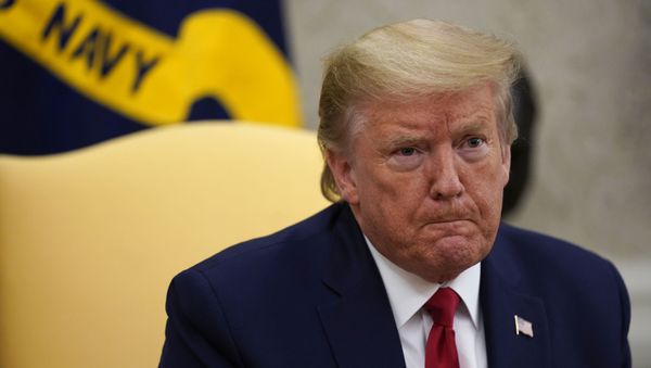 President Donald Trump speaks during a meeting about the coronavirus response with Gov. Greg Abbott, R-Texas, in the Oval Office of the White House, Thursday, May 7, 2020, in Washington.  - Sputnik International