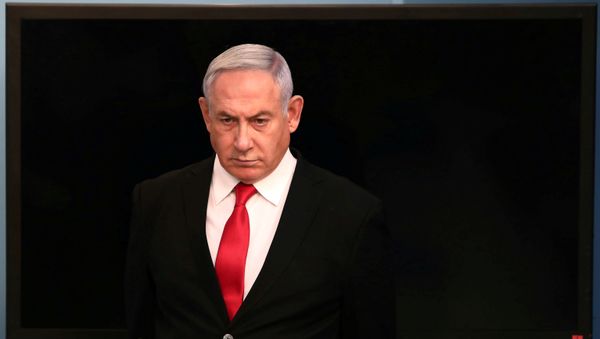 Israeli Prime Minister Benjamin Netanyahu arrives for a speech at his Jerusalem office, regarding the new measures that will be taken to fight the coronavirus, March 14, 2020 Israeli Prime Minister Benjamin Netanyahu arrives for a speech at his Jerusalem office, regarding the new measures that will be taken to fight the coronavirus, March 14, 2020 - Sputnik International