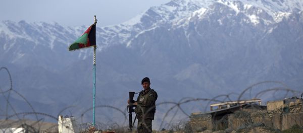 An Afghan National Army soldier stands guard at a checkpoint near the Bagram base north of Kabul, Afghanistan, Wednesday, April 8, 2020. An Afghan official said Wednesday that the country has released 100 Taliban prisoners from Bagram, claiming they are part of 5,000 detainees who are to be freed under a deal between insurgents and U.S. But the Taliban says they have yet to verify those released were on the list they had handed over to Washington during negotiations. - Sputnik International