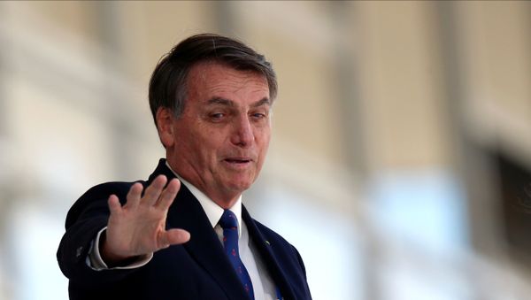 Brazil's President Jair Bolsonaro gestures as he stands at the ramp of the Planalto Palace, amid the coronavirus disease (COVID-19) outbreak in Brasilia, Brazil April 27, 2020 - Sputnik International
