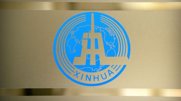 Logo of China's Xinhua News Agency is seen on a glass partition at the agency's newsroom in Beijing. File photo. Logo of China's Xinhua News Agency is seen on a glass partition at the agency's newsroom in Beijing. File photo. - Sputnik International