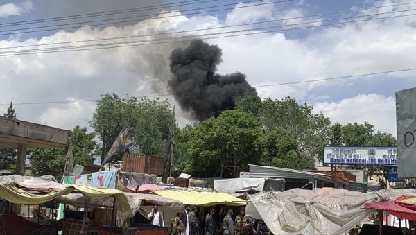 Smokes rises from a hospital after a gunmen attacked in Kabul, Afghanistan, Tuesday, May 12, 2020 - Sputnik International